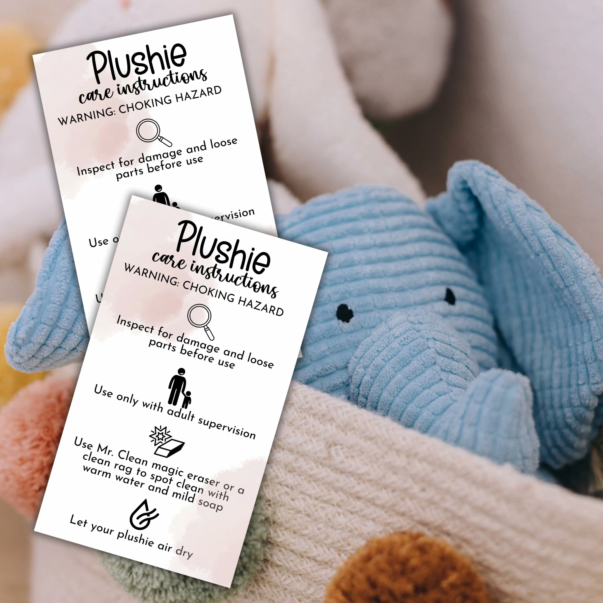 A product development table showing an unbranded plush prototype, fabric swatches, stuffing sample, seam detail, and care label mockup.