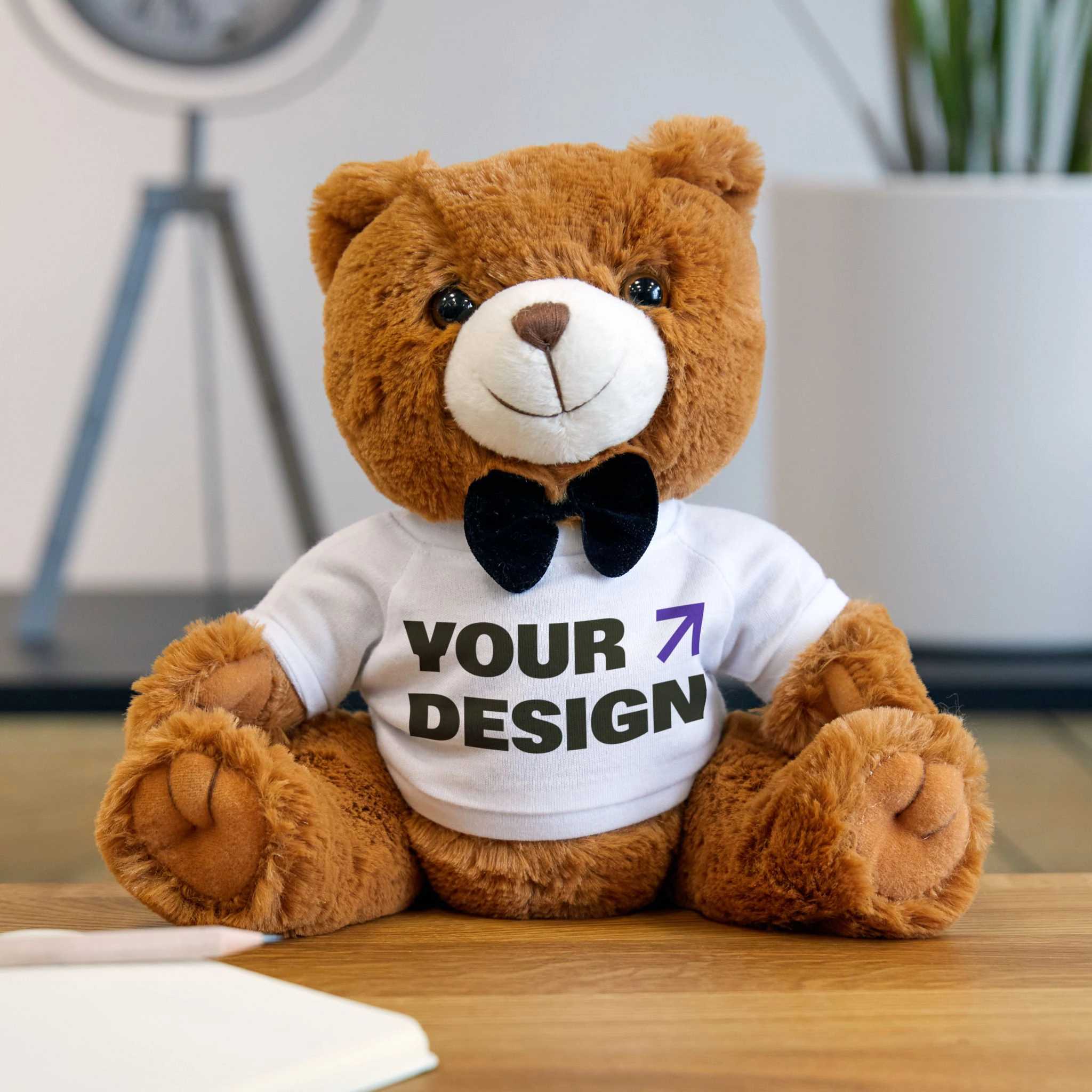 Four unbranded bulk stuffed animal formats arranged for a brand campaign, including a mini mascot, teddy bear, plush keychain, and gift plush